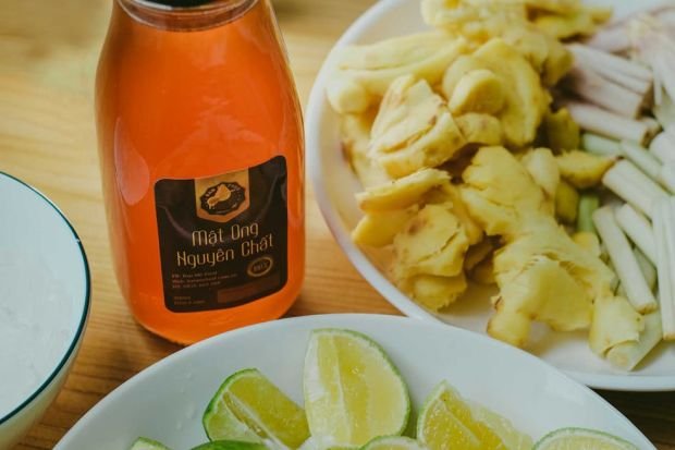 Limes, ginger, and honey ready for a refreshing homemade drink.
